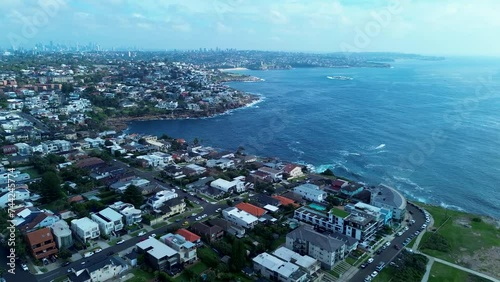 Drone aerial of beautiful Coogee coast headland landscape with housing rocky walking track point Randwick Maroubra Sydney city CBD Australia photo