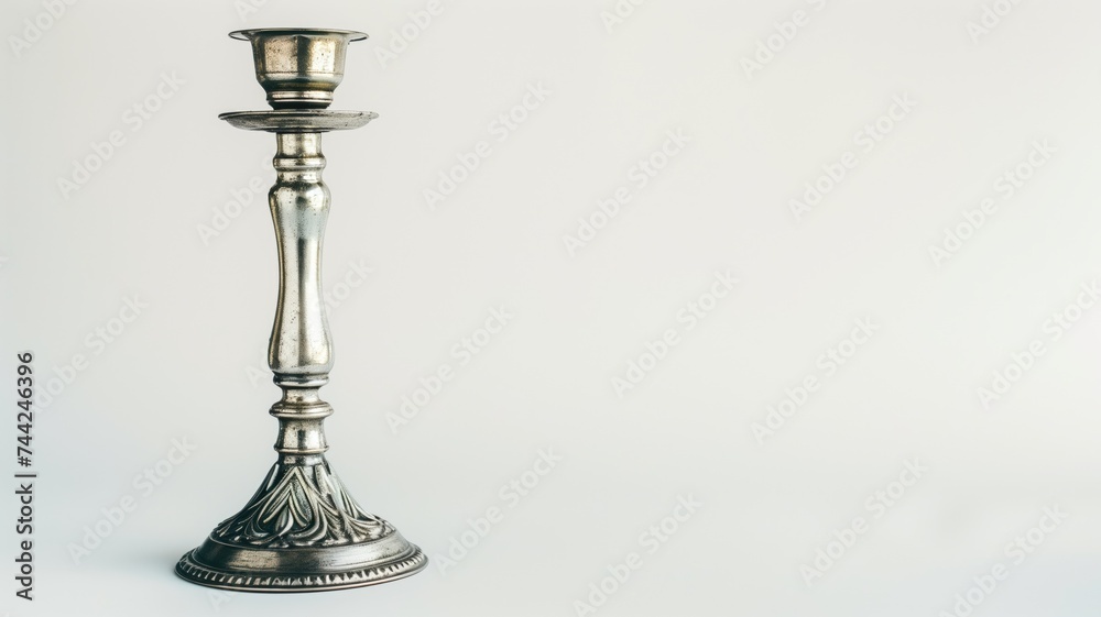 Vintage silver candlestick on a white background