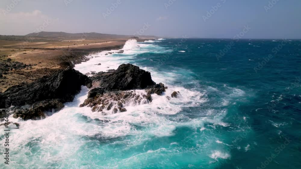 Aruba waves crash against eastern shoreline Aruba waves crash against eastern shoreline