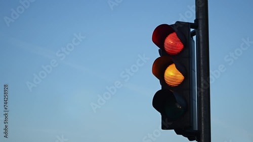 Traffic light semaphore changing from red to green