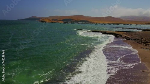 Aerial Views Along the Coastline of Mirador Playa Roja and Views of Lagunillas with Fishing Boats, Peru, South America. photo