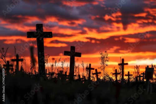 Silhouette of crosses at sunset Reflecting the solemnity and hope of the easter story against a dramatic sky