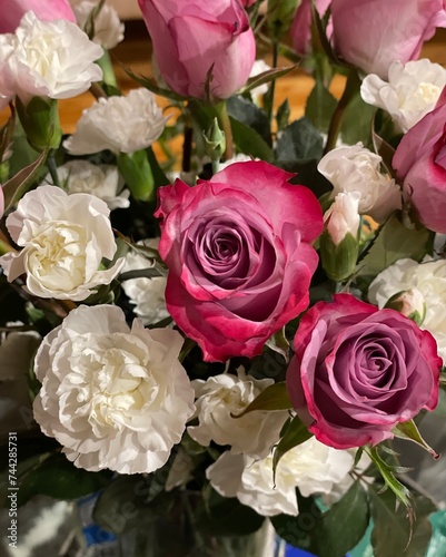 bouquet of pink roses and white carnations 