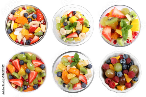 Fruit salad  collection. Mixed fresh berries and fruits in bowls isolated on white  top view