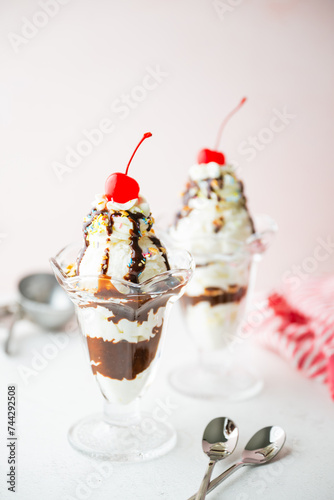 ice cream sundae with cherries and nuts