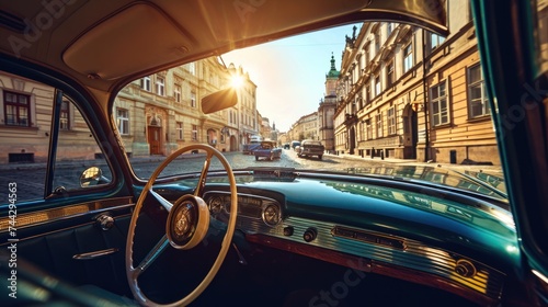 Street view from a vintage car with Historic buildings in the city of Prague, Czech Republic in Europe. © Joyce