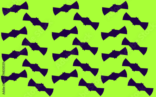 Pattern of blue bowties on a green background.