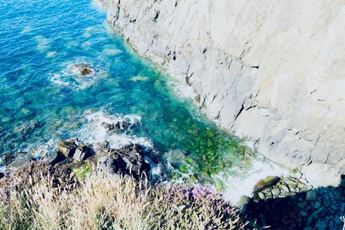 Overlooking the Sea from the cliffs at Strumble Head in Pembrokeshire Wales UK  photo