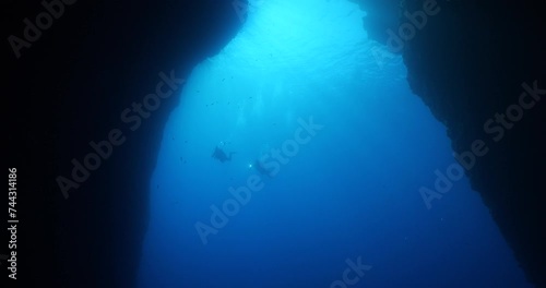Wallpaper Mural sun rays sun beams and sun shine underwater in cave beautiful light scenery in ocean scuba divers to see in cave backgrounds Torontodigital.ca