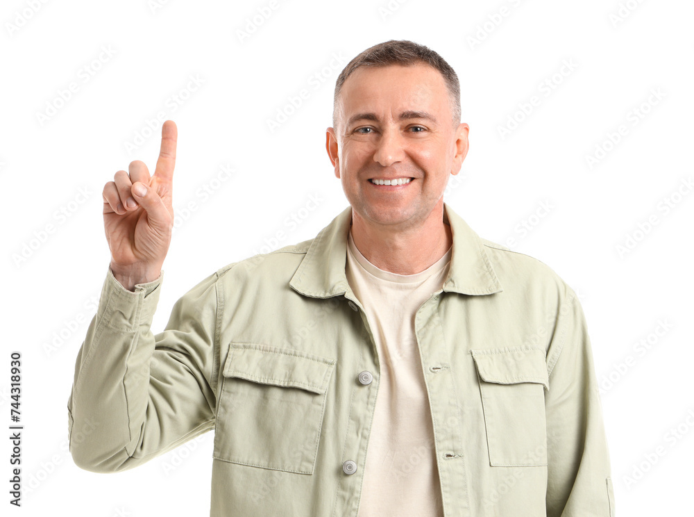 Mature man pointing at something on white background Mature man pointing at something on white background
