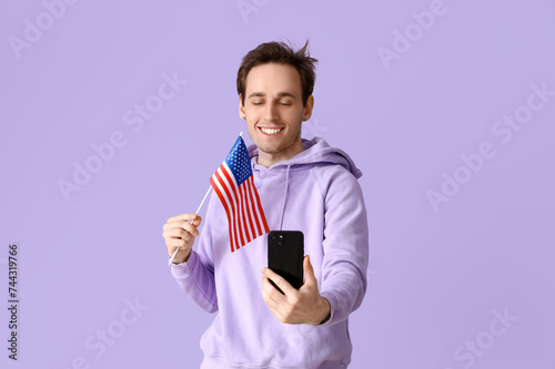 Young man with USA flag and...