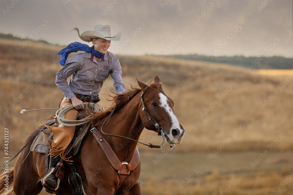 Cowgirl riding a horse galloping running western Cowgirl riding a horse galloping running western