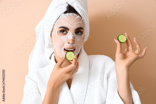 Pretty young woman with fac...