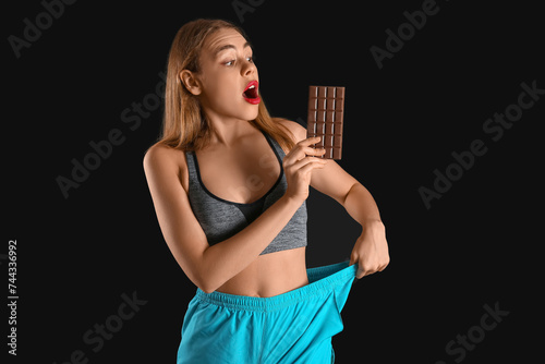 Shocked young woman with ch...