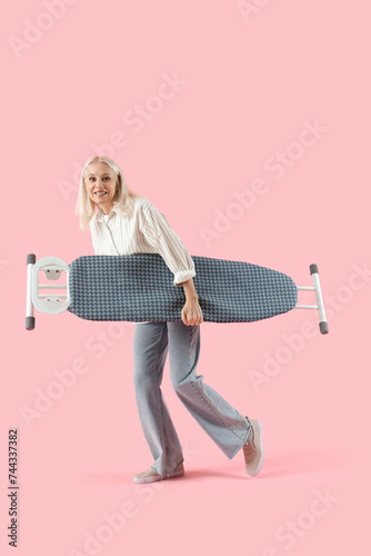 Mature woman running with i...