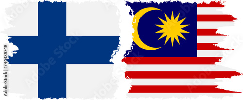 Malaysia and Finland grunge flags connection vector