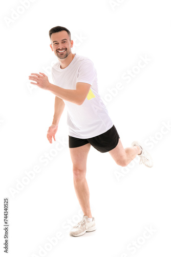 Handsome young happy man in sportswear isolated on white background