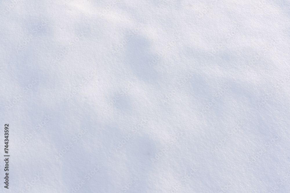 atural Snowdrift in sunny day. Nature Winter snow texture background.