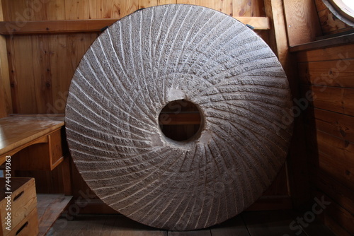 Stone wheel of water mill closeup