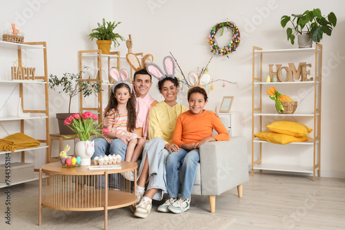 Happy diverse family wearin...