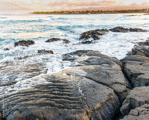 Waves Washing Over Volcanic Shoreline on Kapalaoa Beach , Anaehoʻomalu Bay, Hawaii Island, Hawaii, USA photo