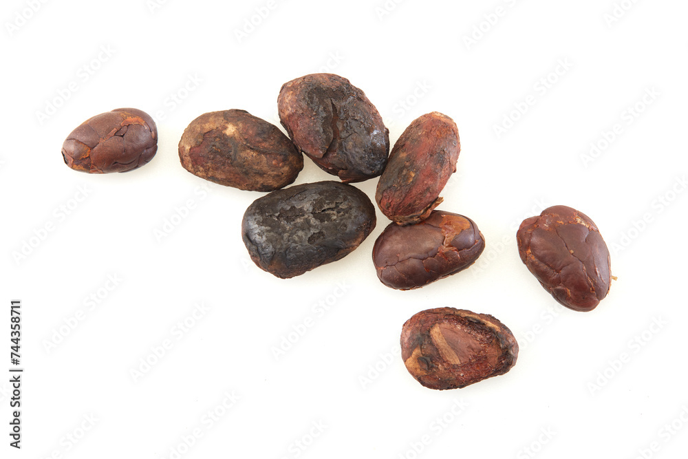 Unpeeled cocoa bean isolated on white background Unpeeled cocoa bean isolated on white background
