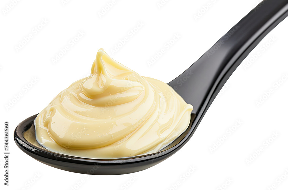 Close-up of black spoon with mayonnaise isolated on transparent background Close-up of black spoon with mayonnaise isolated on transparent background