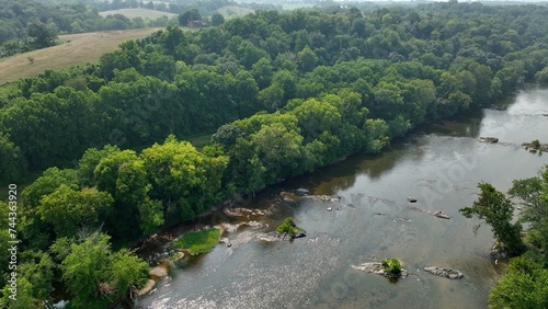 Potomac river gently flowing in peaceful countryside in Maryland, Virginia state line