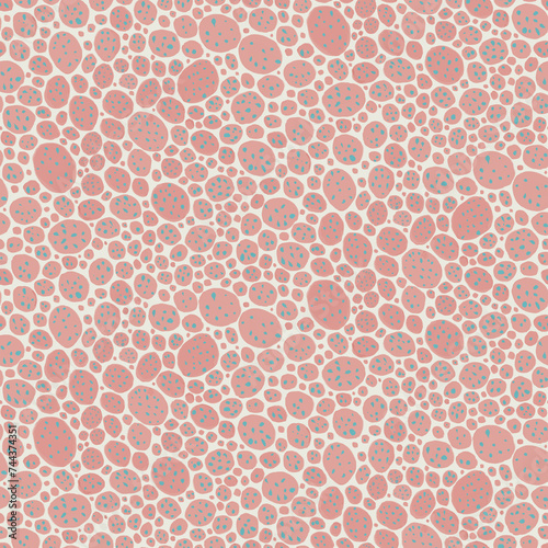Seamless pattern with charming hand drawn pink gouache polka dots. Modern boho pattern