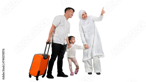 Happy muslim family of three holding passports posing with suitcase