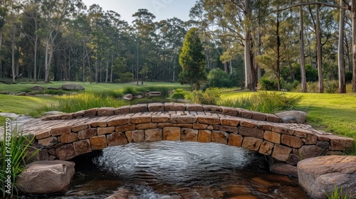 Stone bridge at the cedar Creek, Samford, Brisbane, Queensland, like in a fairy tale photo