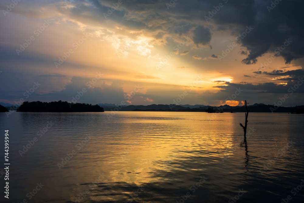 rays of sunset through cloud at Pom Pee reservoir viewpoint rays of sunset through cloud at Pom Pee reservoir viewpoint