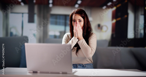 Women With Laptop Computer Celebrating