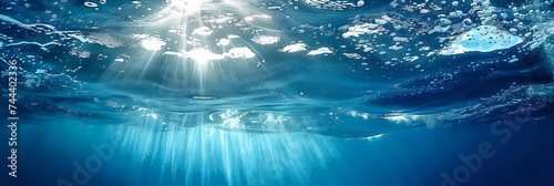 underwater blue sea with sun light,Dark blue ocean light