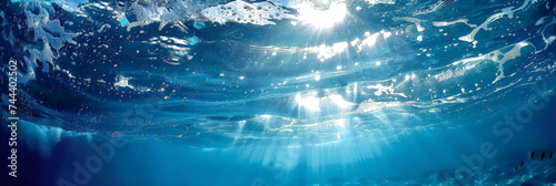 underwater blue sea with sun light,Dark blue ocean light