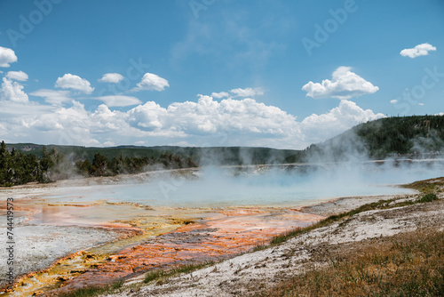 Colorful Imperial Geyser steaming at Yellowstone National Park
