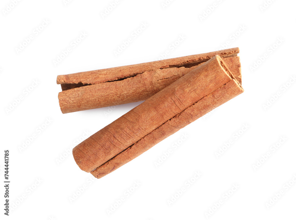 Cinnamon sticks isolated on white, top view Cinnamon sticks isolated on white, top view
