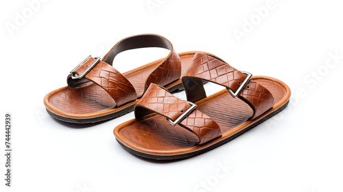 A pair of leather sandals isolated on a white background