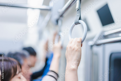 満員電車に乗る乗客たち photo
