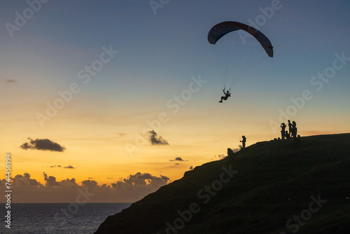 paragliding in the sunset