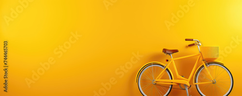 Retro bicycle  on yellow background. photo