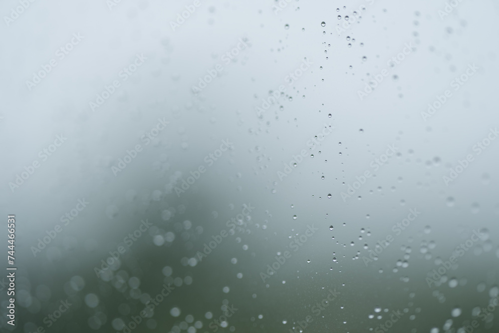 Rain drop on clean window with coating closeup Rain drop on clean window with coating closeup