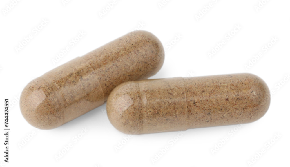 Vitamin capsules isolated on white. Health supplements Vitamin capsules isolated on white. Health supplements