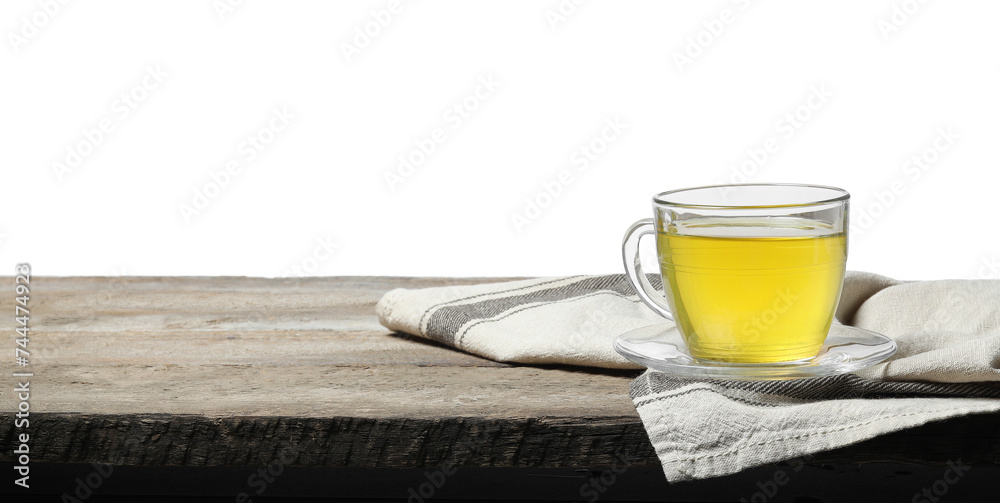 Refreshing green tea in cup on wooden table against white background Refreshing green tea in cup on wooden table against white background