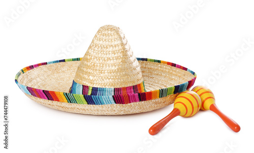 Mexican sombrero hat and maracas isolated on white