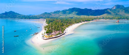 Fototapeta Naklejka Na Ścianę i Meble -  Drone top view at Koh Muk a tropical island in Trang Southern Thailand, a turqouse colored ocean in Koh Mook Trang Thailand with a white soft powdery sand beach