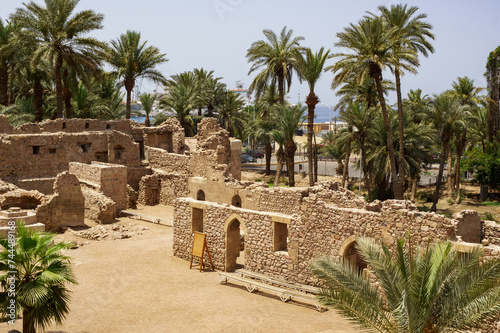 Antick ruins of Aqaba Fortress walls, or Aqaba Castle, Mamluk Castle, Jordan. Fortress was built by Crusaders in the 12th century. Aqaba Castle has quadrangular shape with stone towers at corners. photo