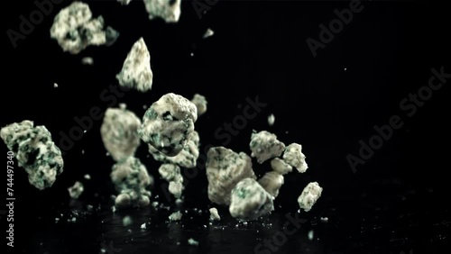 Super slow motion blue cheese on black background. Filmed on a high-speed camera at 1000 fps. High quality FullHD footage photo