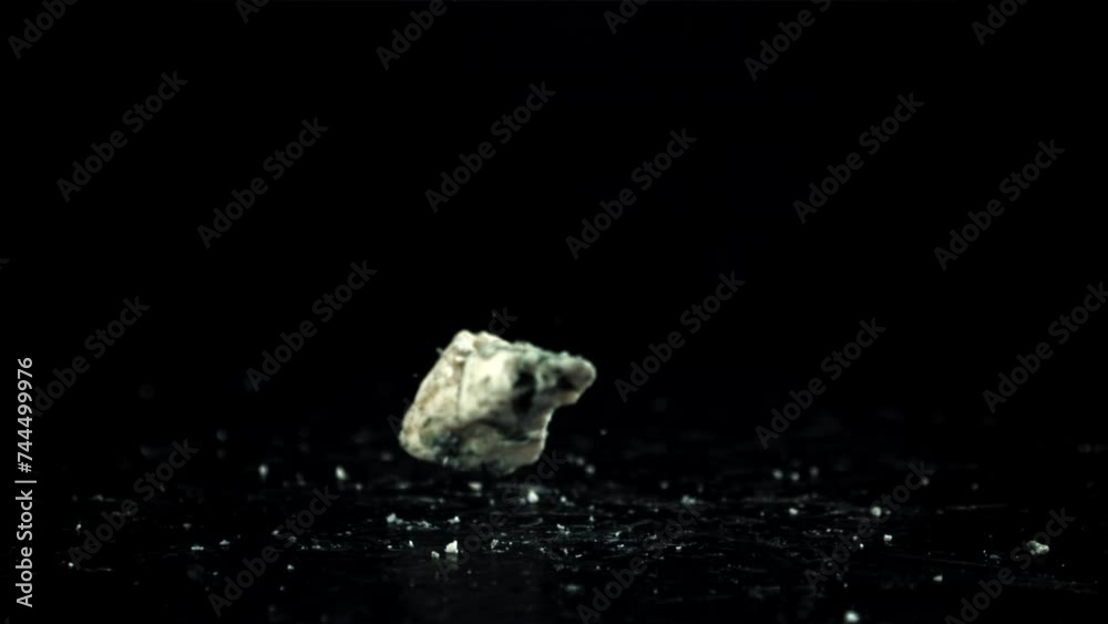 Super slow motion blue cheese on black background. Filmed on a high-speed camera at 1000 fps. High quality FullHD footage Super slow motion blue cheese on black background. Filmed on a high-speed camera at 1000 fps. High quality FullHD footage