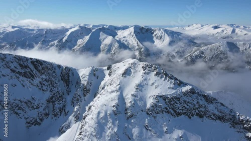 Amazing Aerial Winter view of Rila mountain near Musala peak, Bulgaria photo